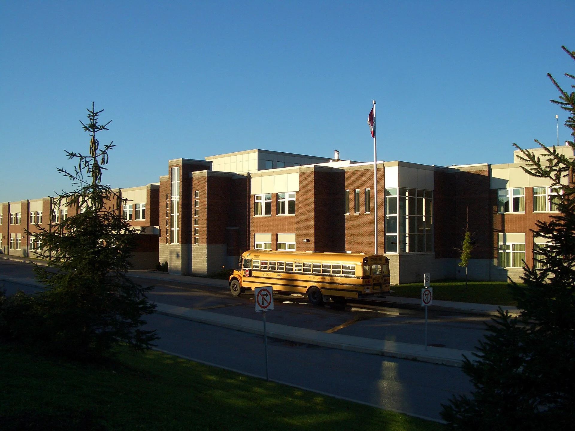 St. Augustine Catholic High School, a York Catholic school in Markham, with a school bus out front