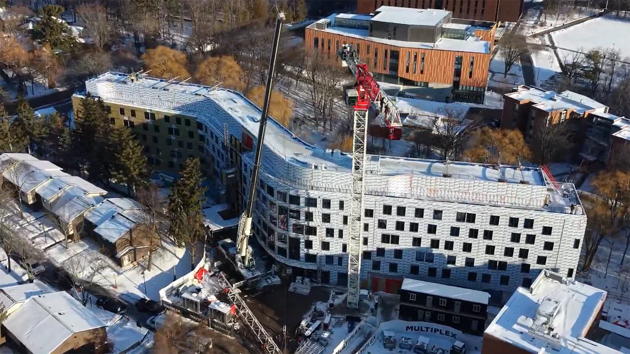 Aerial view of UTM's new six-storey residence under construction on the snowy Mississauga campus