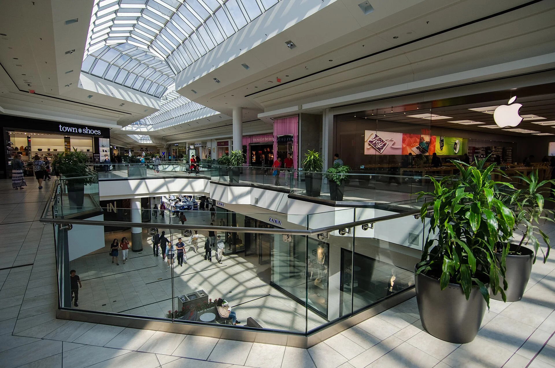The two-level atrium inside CF Markville shopping centre in Markham under a glass skylight