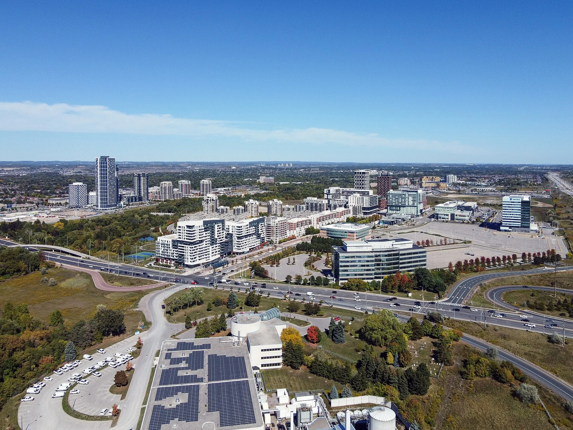 Aerial view of Downtown Markham, with mid-rise and high-rise residential buildings beside Highway 407