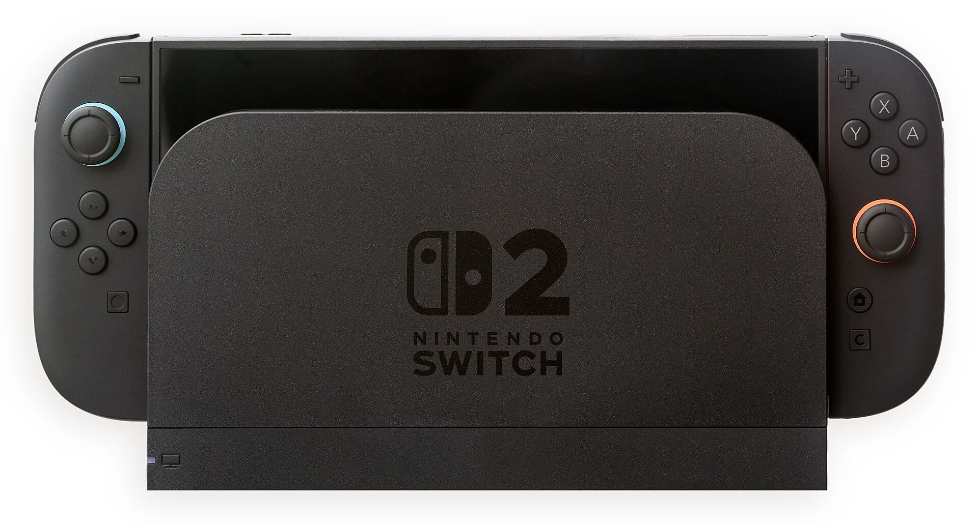 A Nintendo Switch 2 console sitting in its dock, with blue and orange accents on the controllers