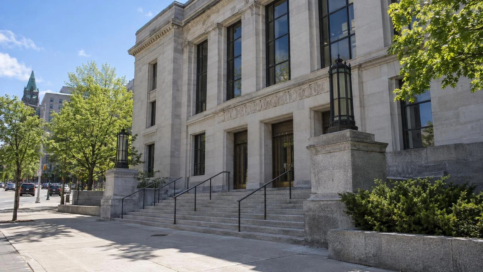 The exterior of an Ontario courthouse under a clear spring sky.