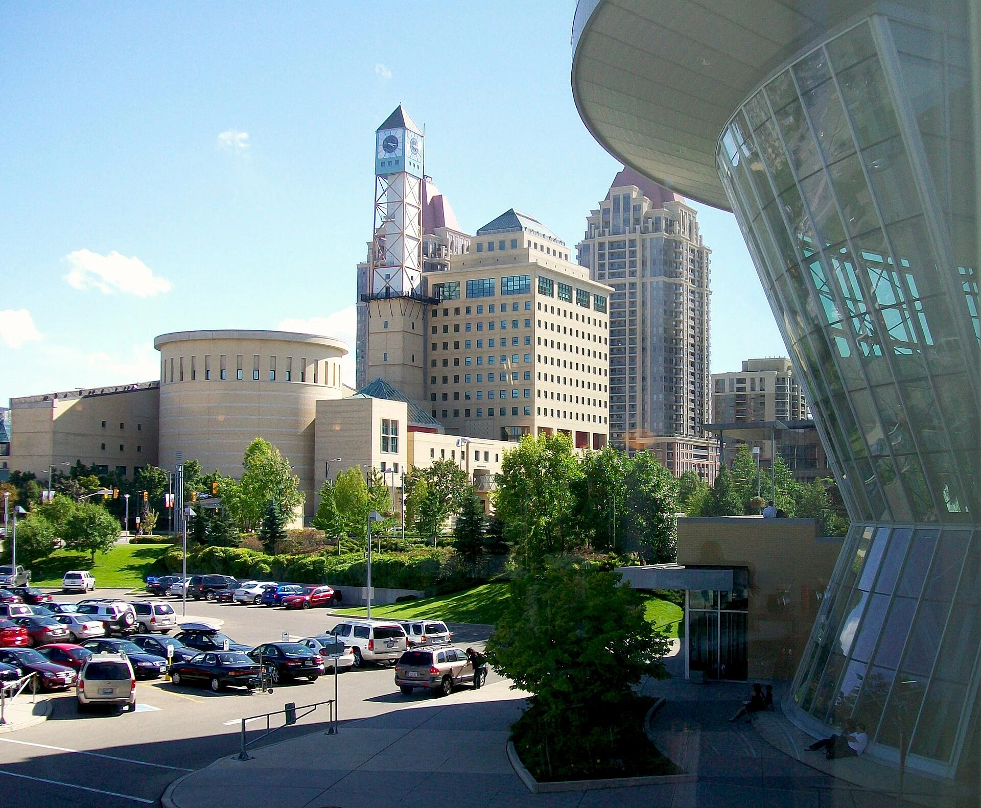 Illustration of Mississauga Civic Centre viewed from the public square with spring foliage.