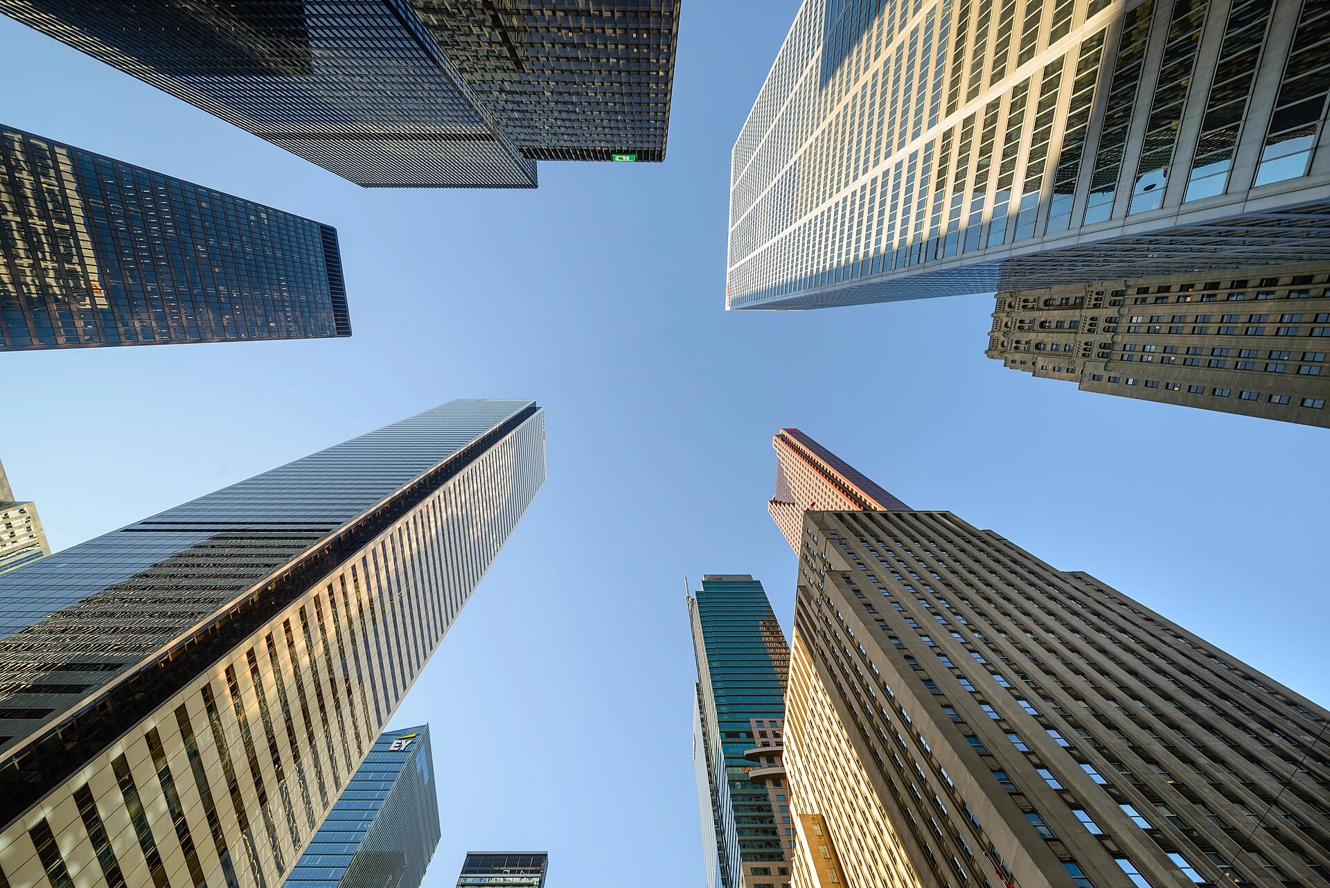 Downtown Toronto's Financial District office towers under a summer sky.
