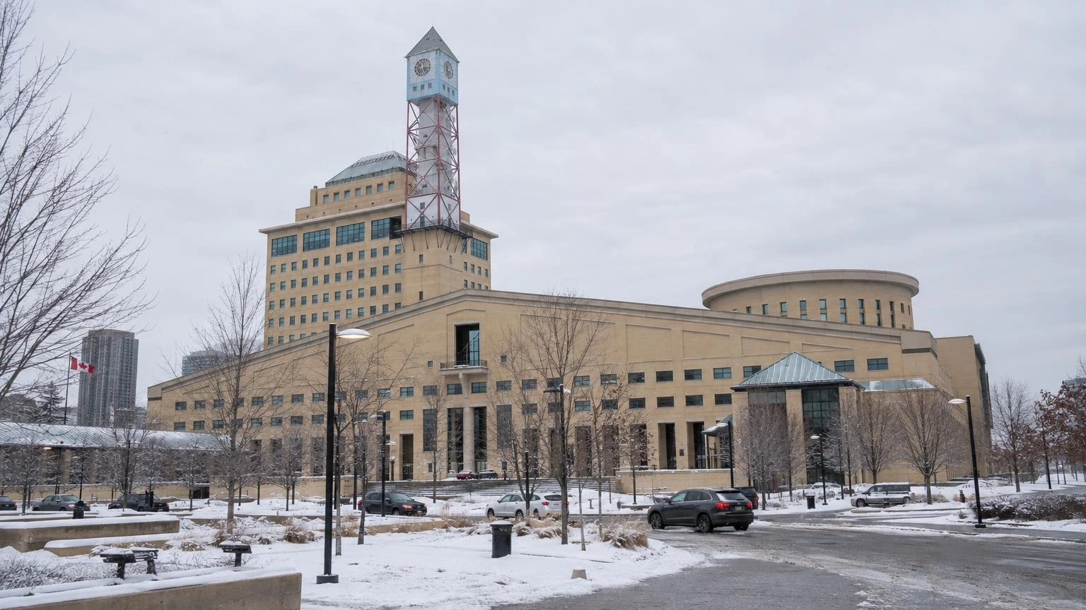 A wide shot of the Mississauga Civic Centre exterior on a cold winter day.