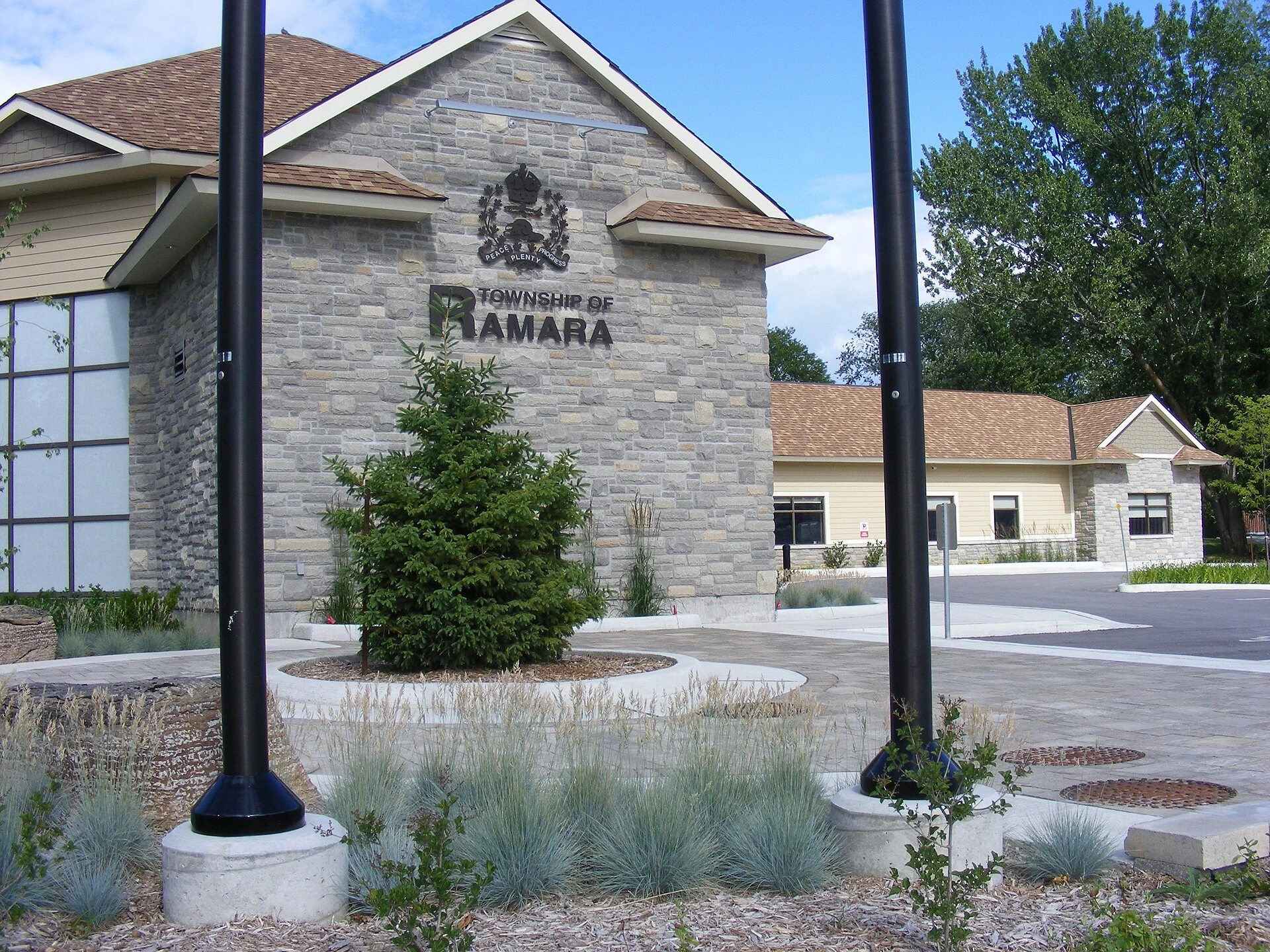 A closed municipal building entrance in an Ontario township during autumn.