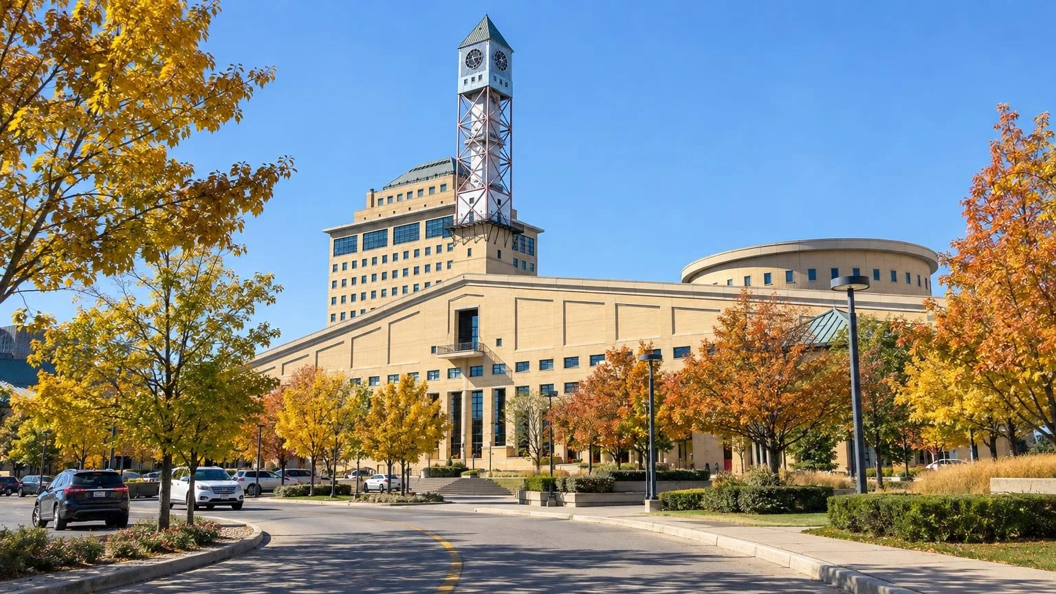 A view of the exterior of Mississauga City Hall during a bright autumn day.