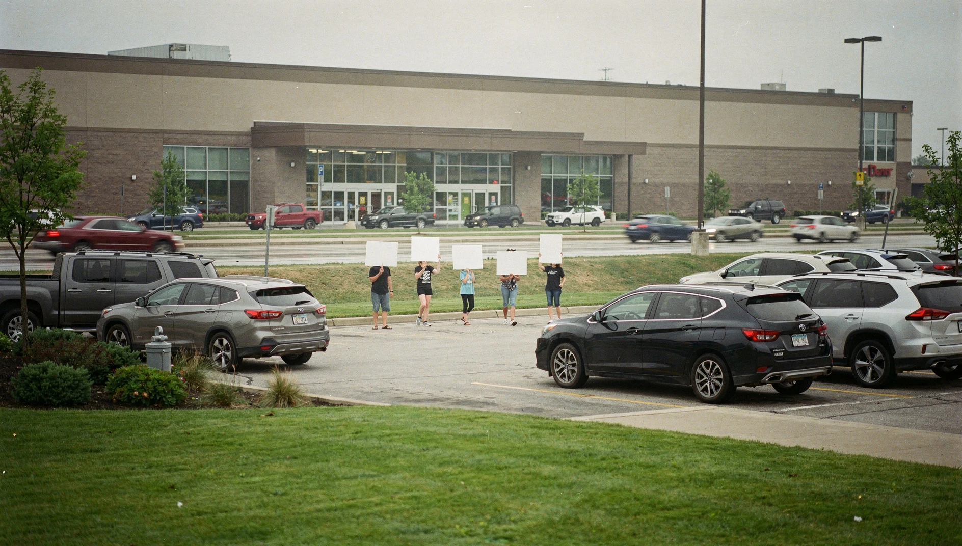 Illustration of picketers walking outside a large casino complex on a summer morning in Durham Region.
