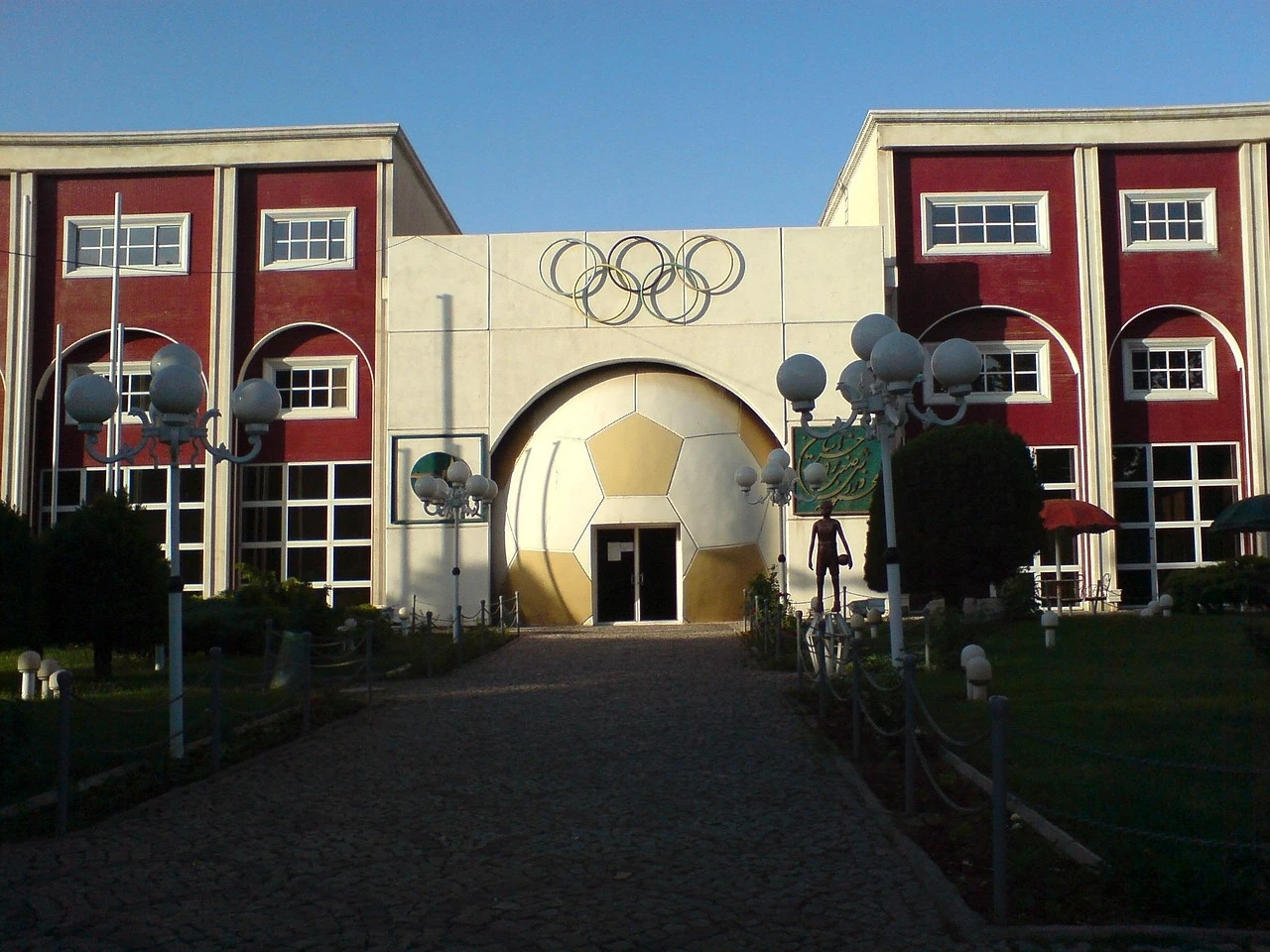 The exterior of a modern community recreation centre in Ontario during autumn.