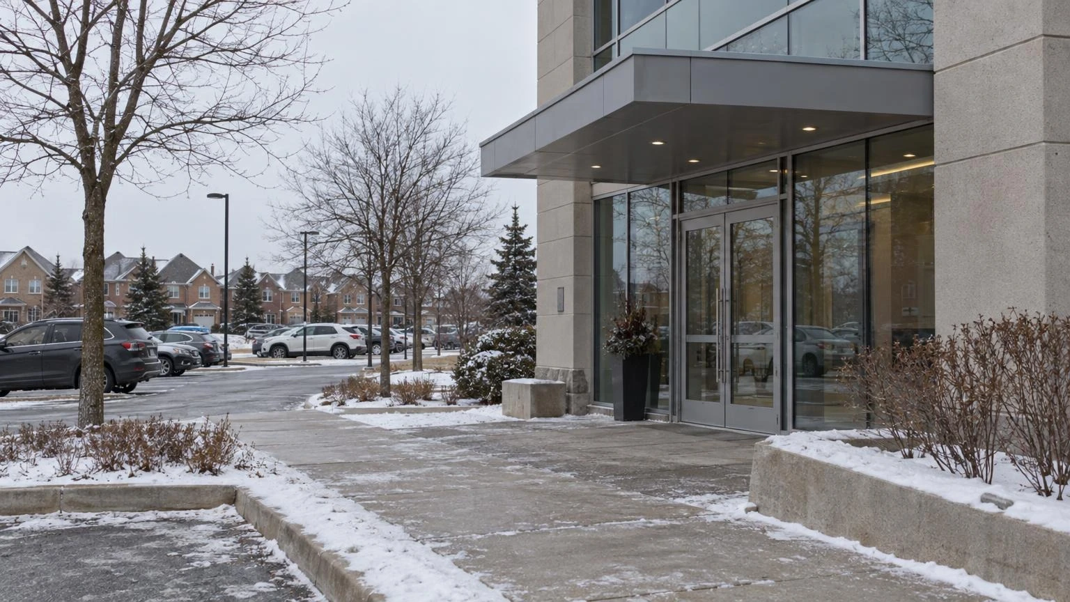 An illustration of a modern office building entrance in Toronto during a winter afternoon.