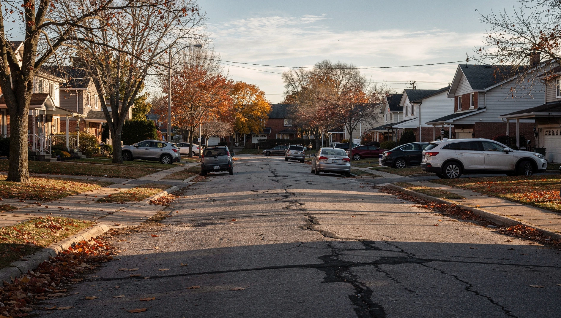 A wide shot of an Ottawa residential street during a cool autumn afternoon.
