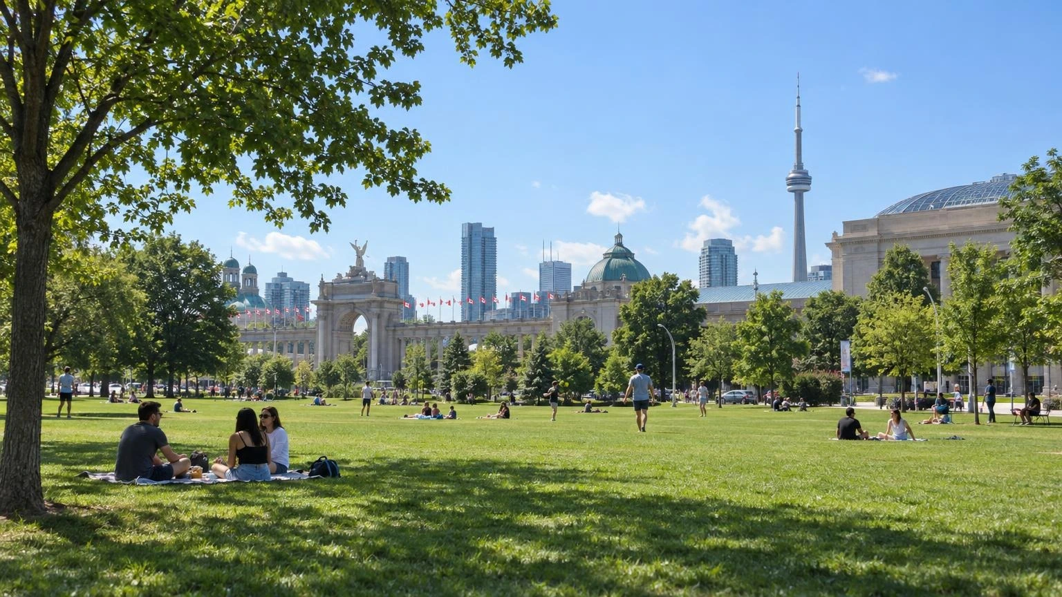 An outdoor grassy field at Exhibition Place in Toronto during a sunny summer afternoon.