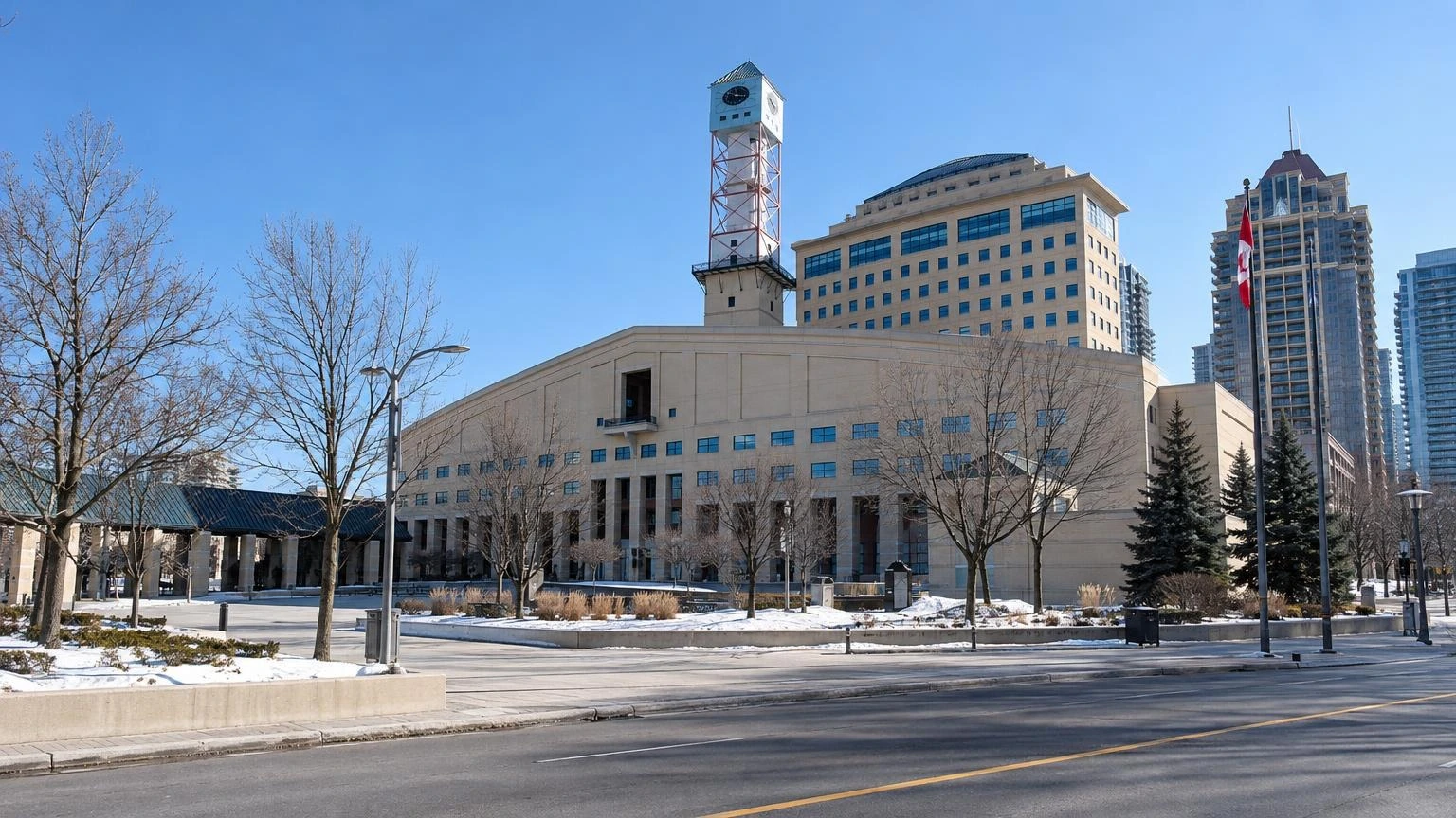 The exterior of Mississauga City Hall on a clear winter day.