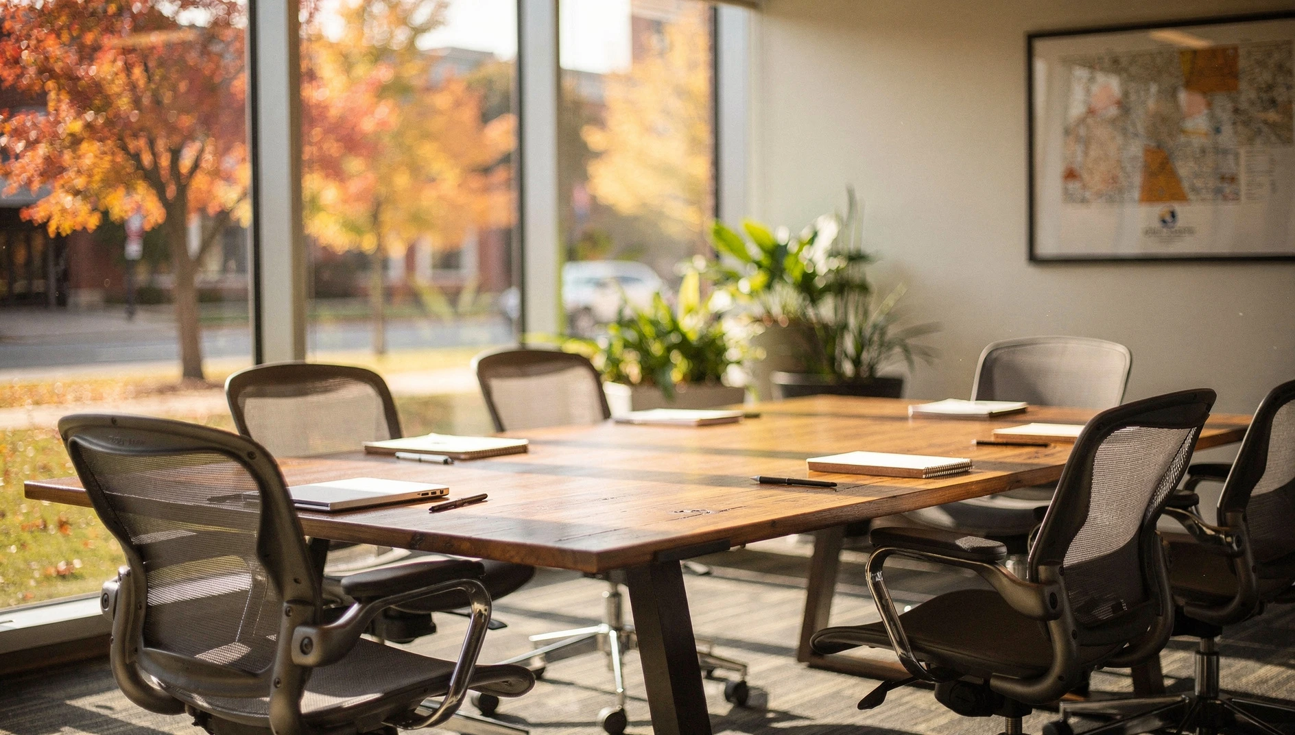 A professional office setting with modern furniture and warm lighting.