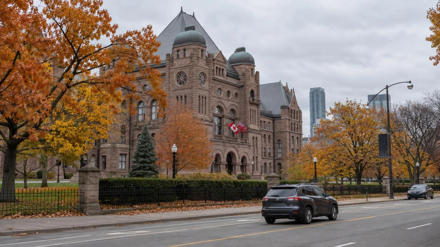 A wide shot of the Ontario Legislative Building at Queen's Park under an autumn sky.