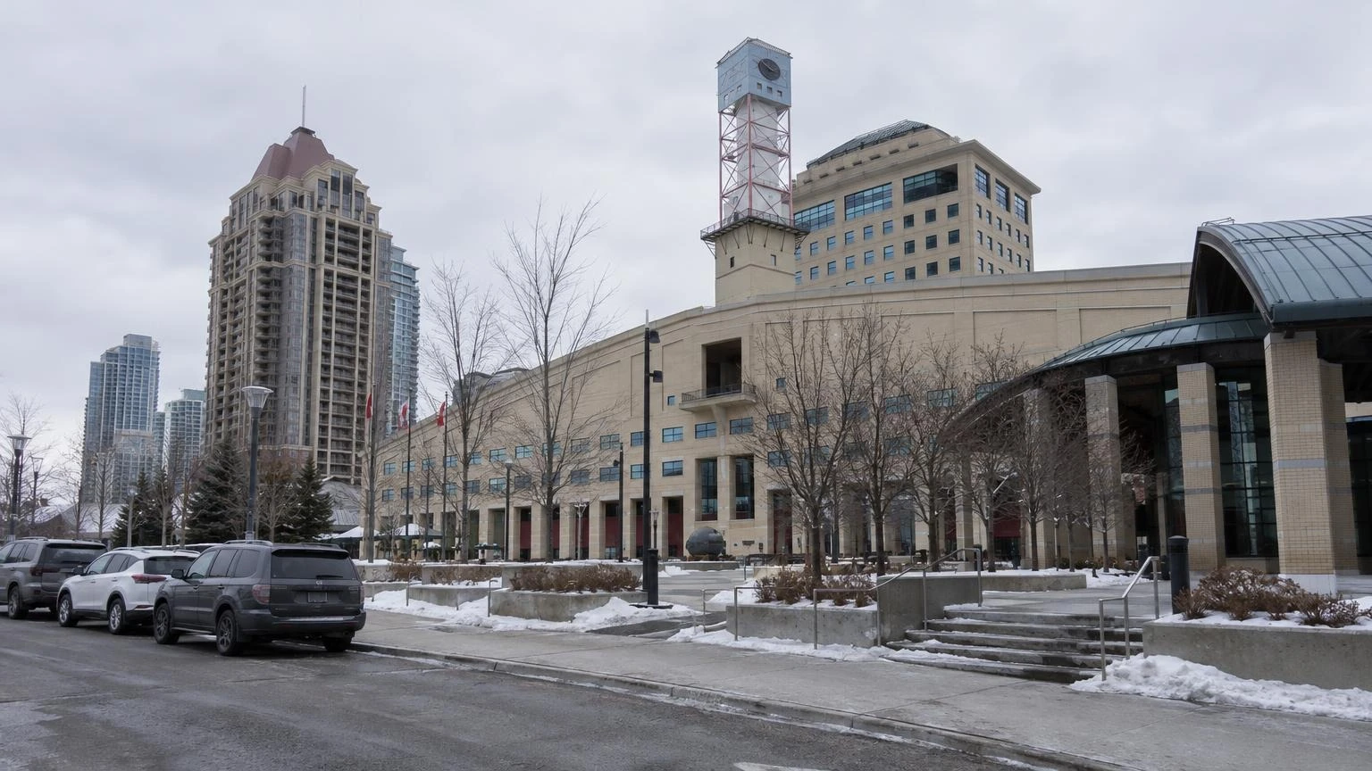 An exterior view of a municipal building in Mississauga, Ontario, under a grey winter sky.