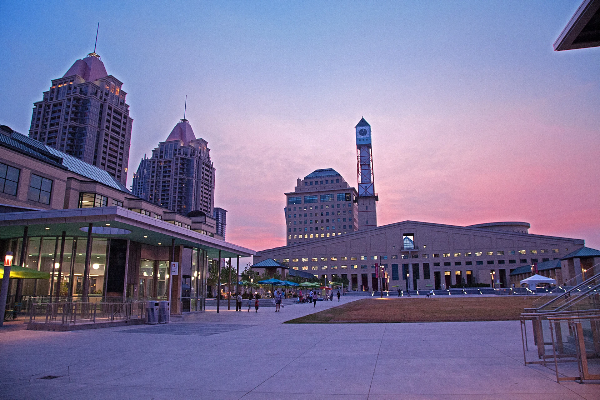 Illustration of a municipal building and public square in winter.